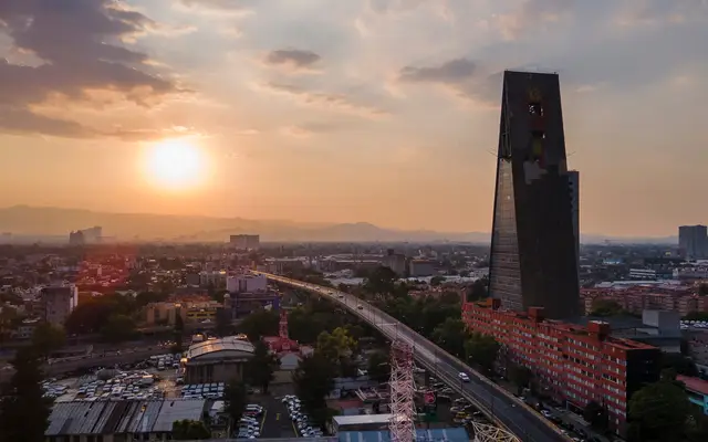 Towers of the Valley of Mexico metropolitan area at sunset