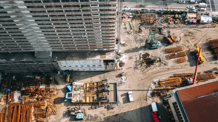 Aerial view of a commercial site with heavy machinery